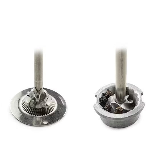 Two metal mills components on a white background