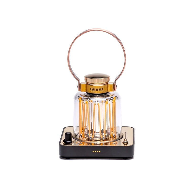 Clear lantern with gold accents on a white background
