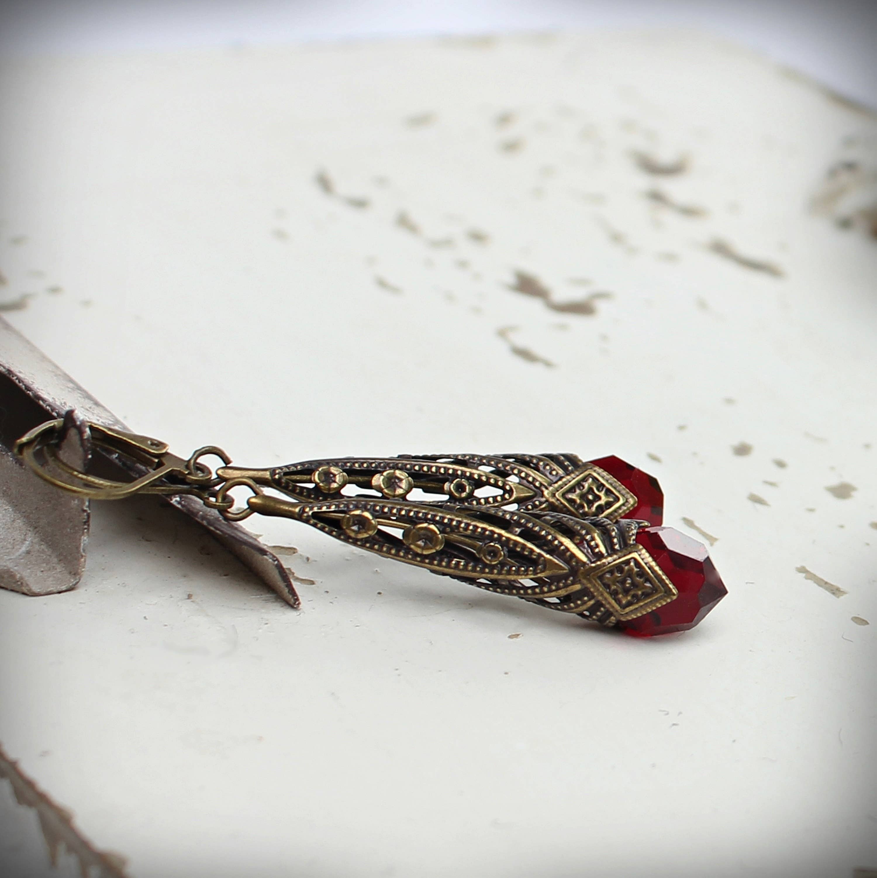 Antique-gold Art Deco drop earrings set with deep-red garnet crystal – Circa 1890