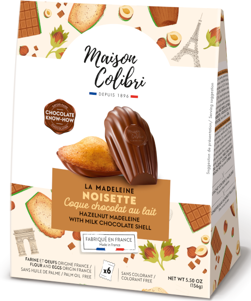 Cream Maison Colibri box of hazelnut madeleines with milk chocolate shell, one cake shown beside its scallop-shaped shell – Maison Colibri
