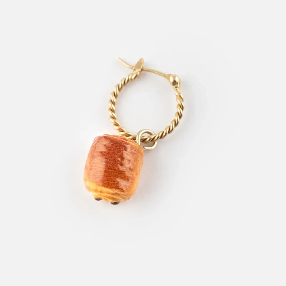 Gold hoop earring with a chocolatine on a white background