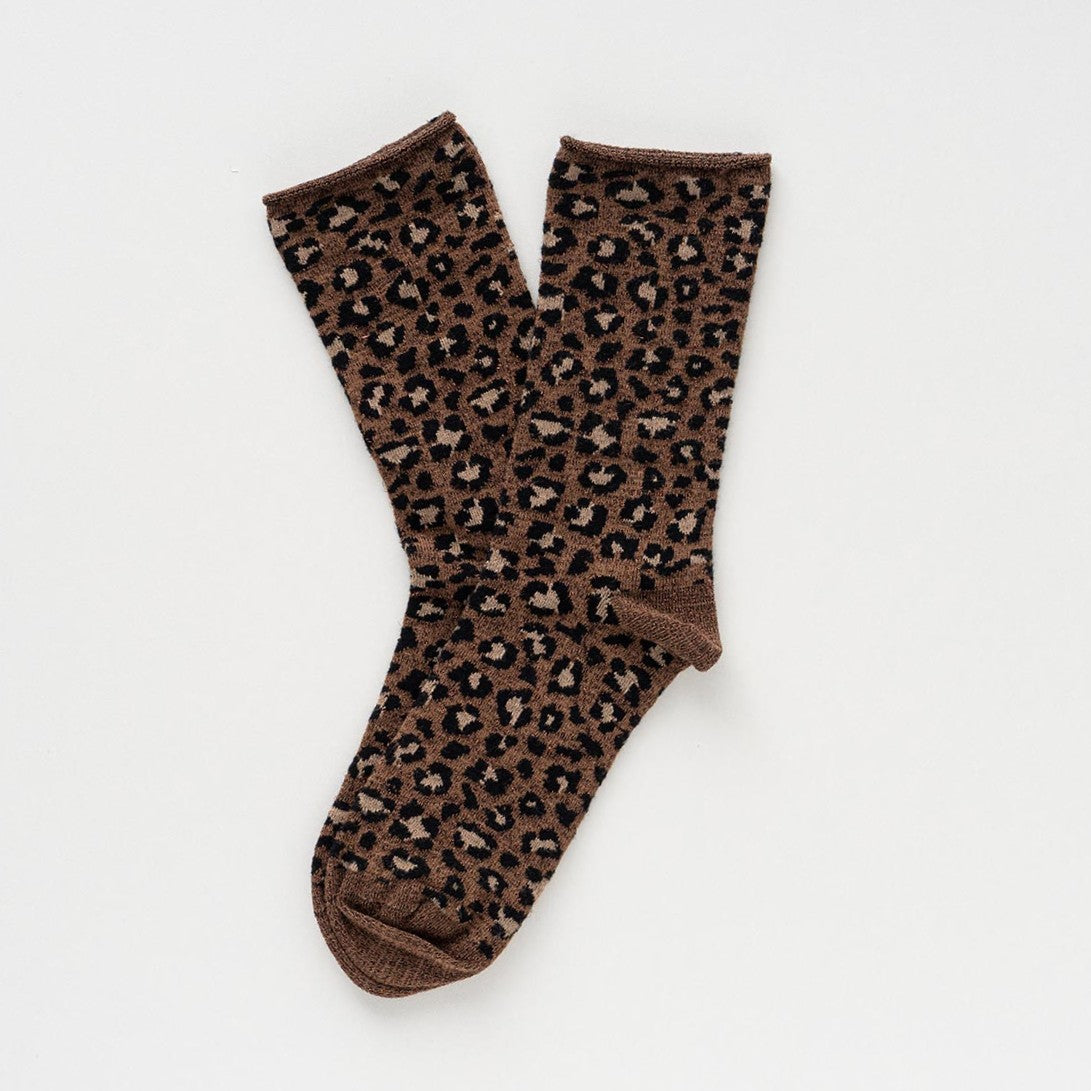Brown and beige leopard-print socks with glitter, laid flat to show the rolled cuffs – KLUE