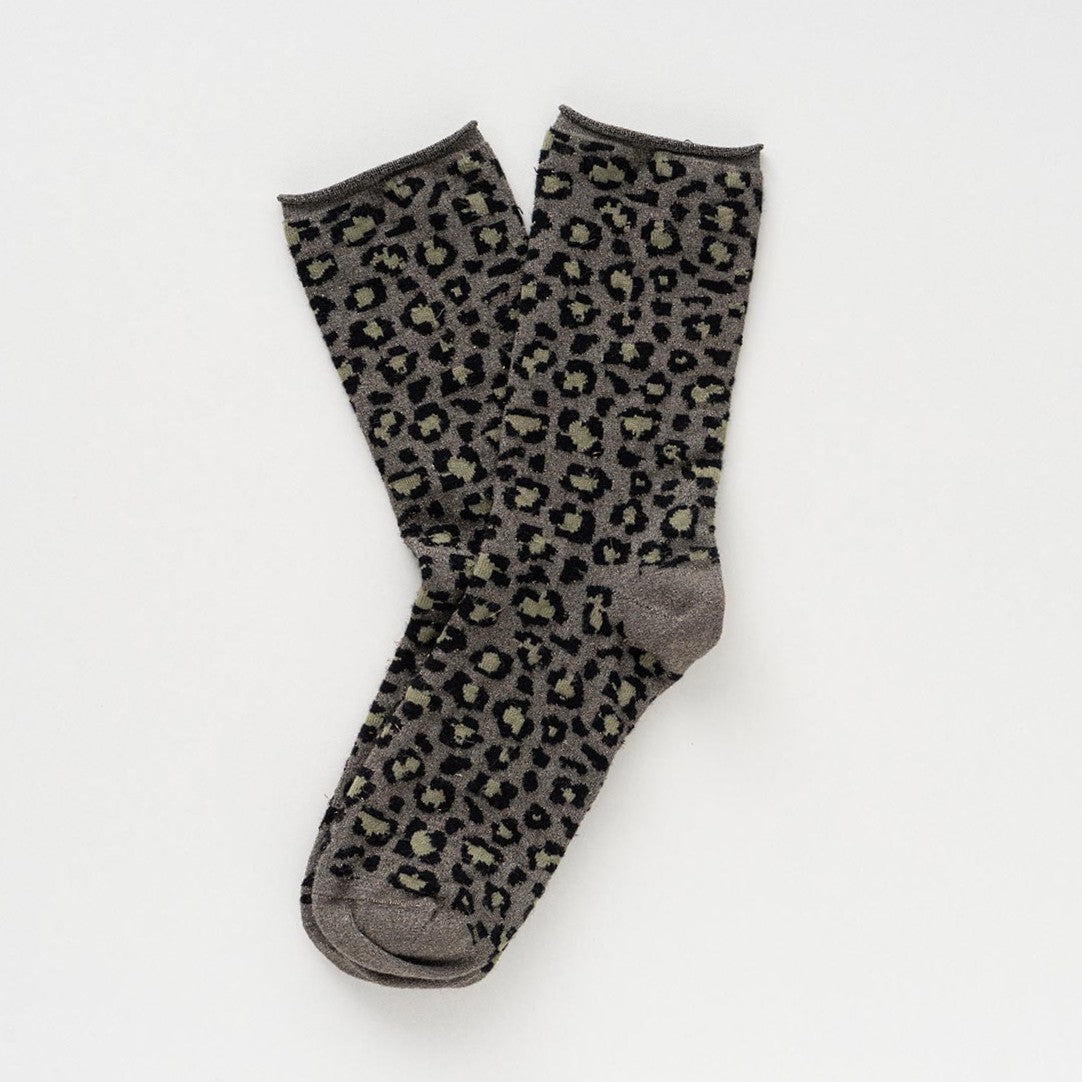 Khaki and grey leopard-print socks with glitter, laid flat to show the rolled cuffs – KLUE