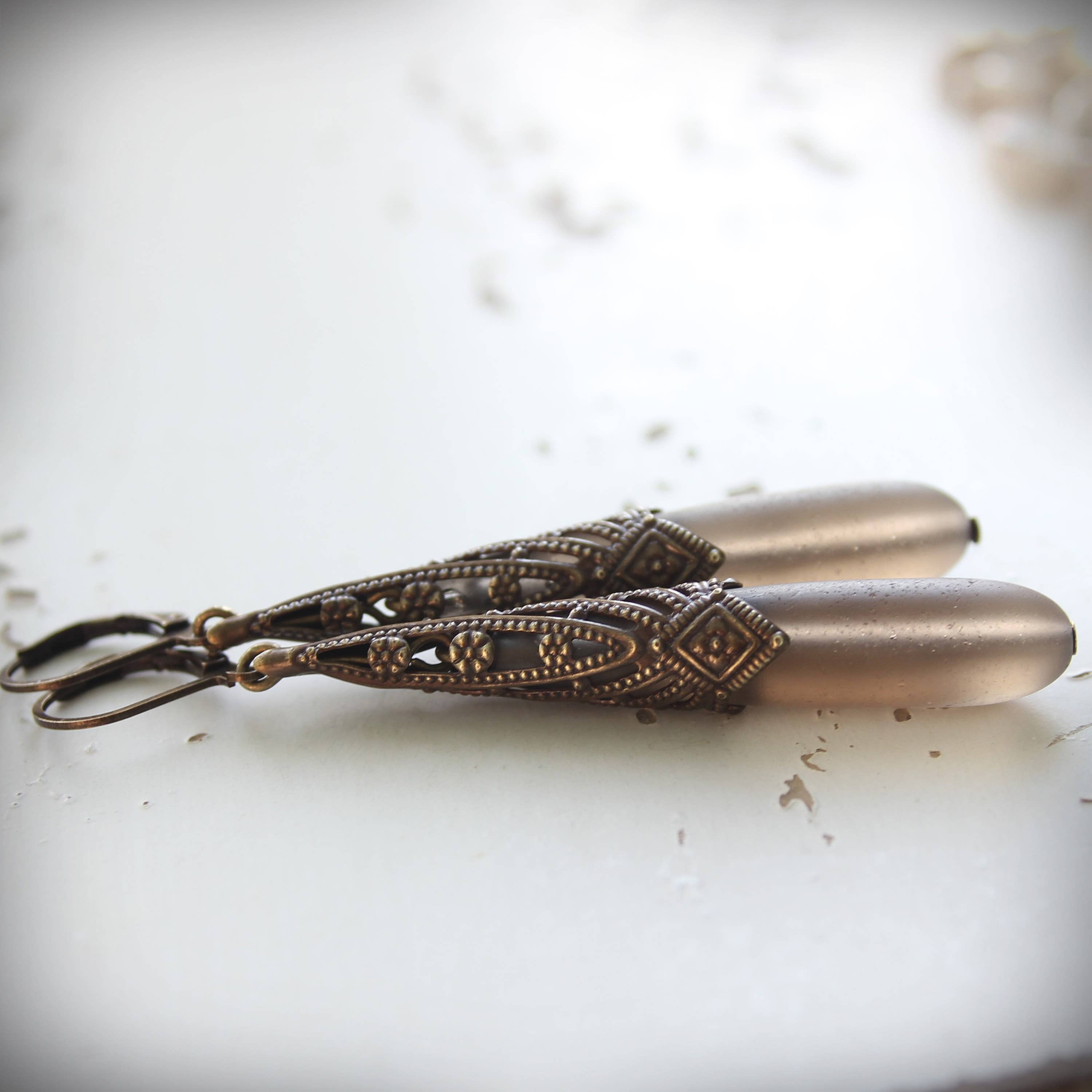 Long smoky glass Art Deco earrings shown full length – Circa 1890