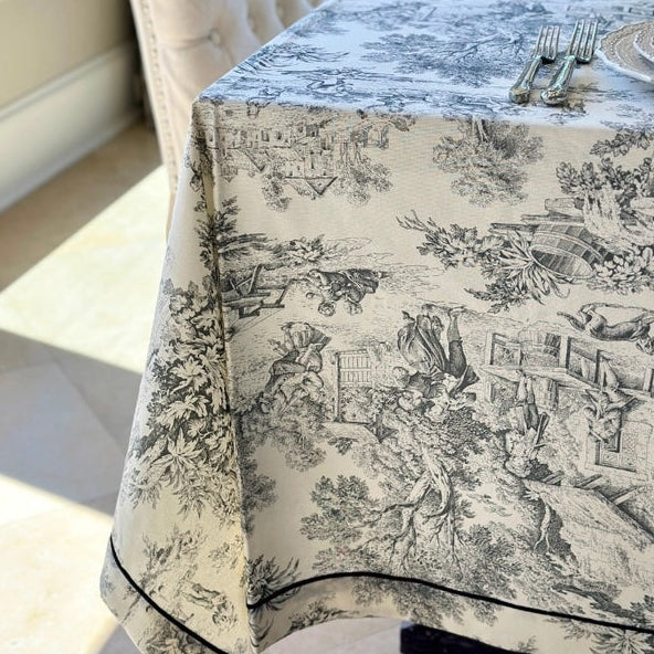 Tablecloth with black and white pattern on a dining table