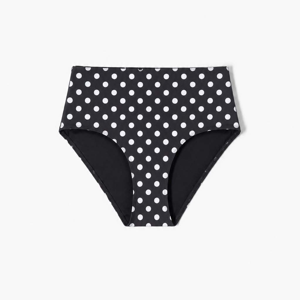 Detail of the large white dots printed on the black matte swim fabric – Blanche Edit