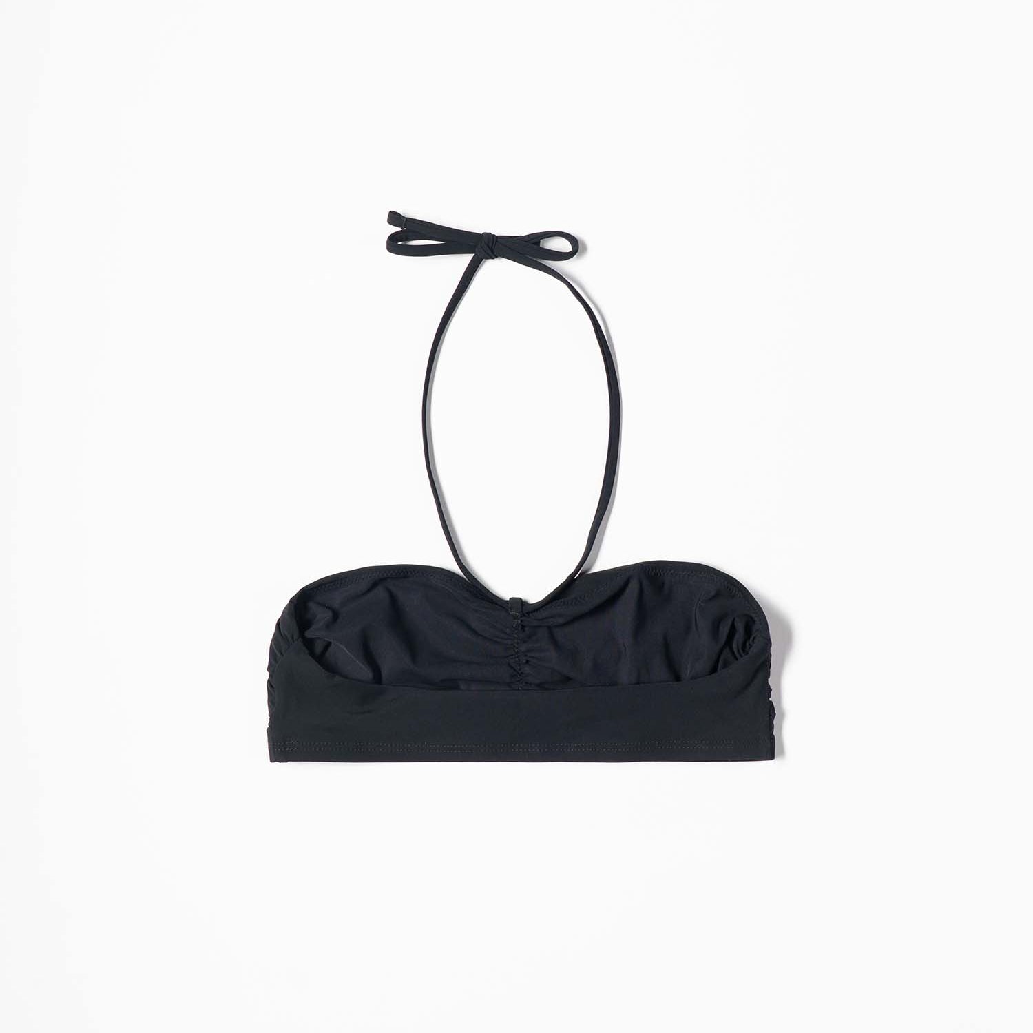 Black bandeau bikini top styled on the beach, full look – Blanche Edit