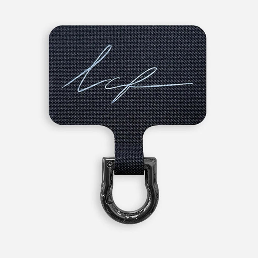 adapter for phone strap made of a black tag and a black carabiner