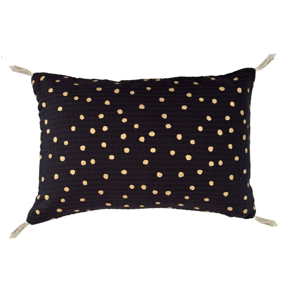 A small cushion cover with a black and gold dots block print design.