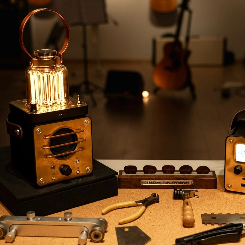 Vintage-style radio receiver on a table with tools and equipment in a dimly lit room.