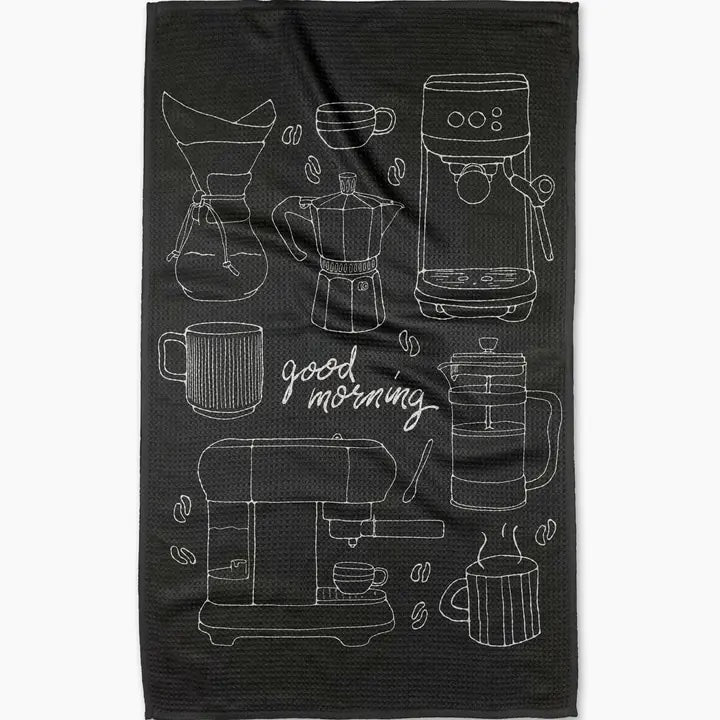 Black towel with white line drawings of coffee-making equipment and 'good morning' text.