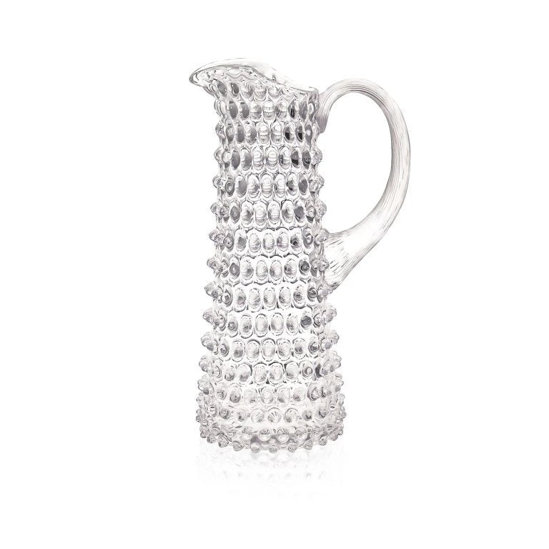 Crystal clear pitcher on a white background