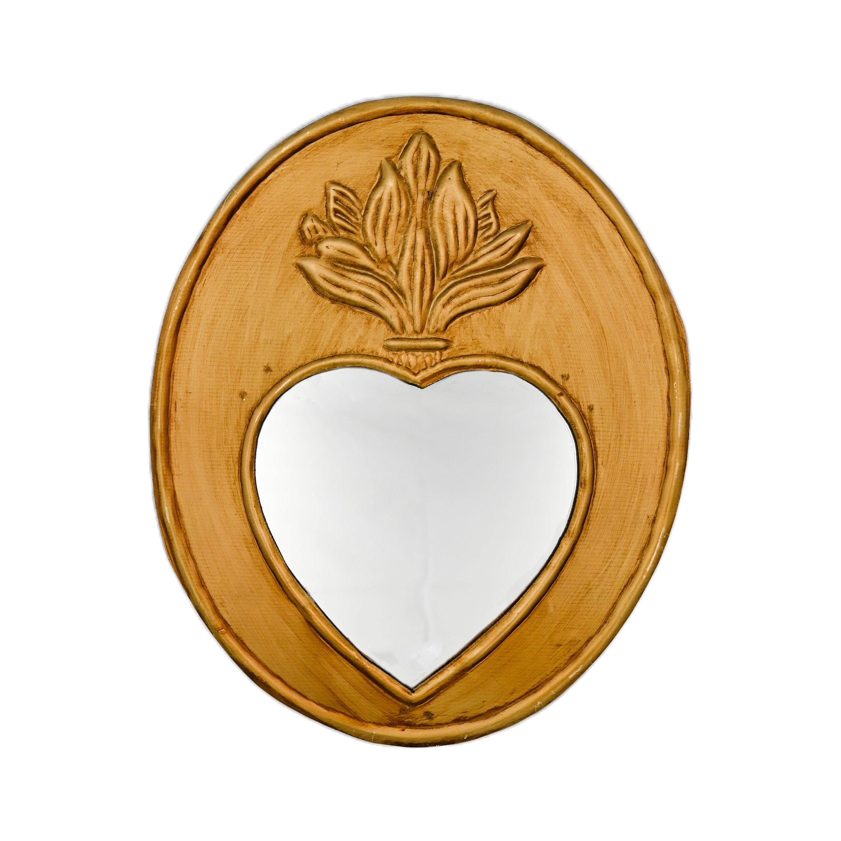 A handcrafted oval-shaped mirror with a gold patina and a floral design at the top, featuring a heart-shaped clearing in the center.