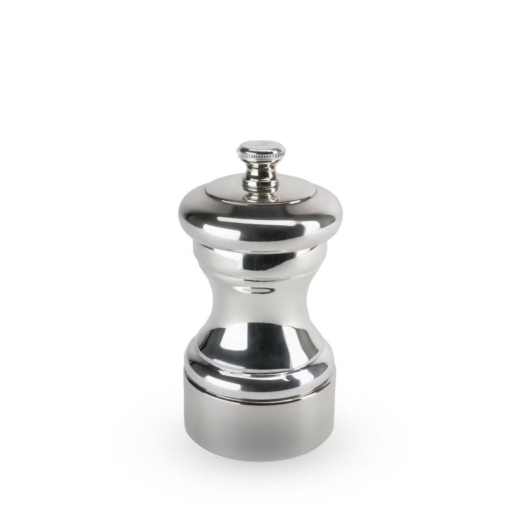 Silver pepper grinder on a white background