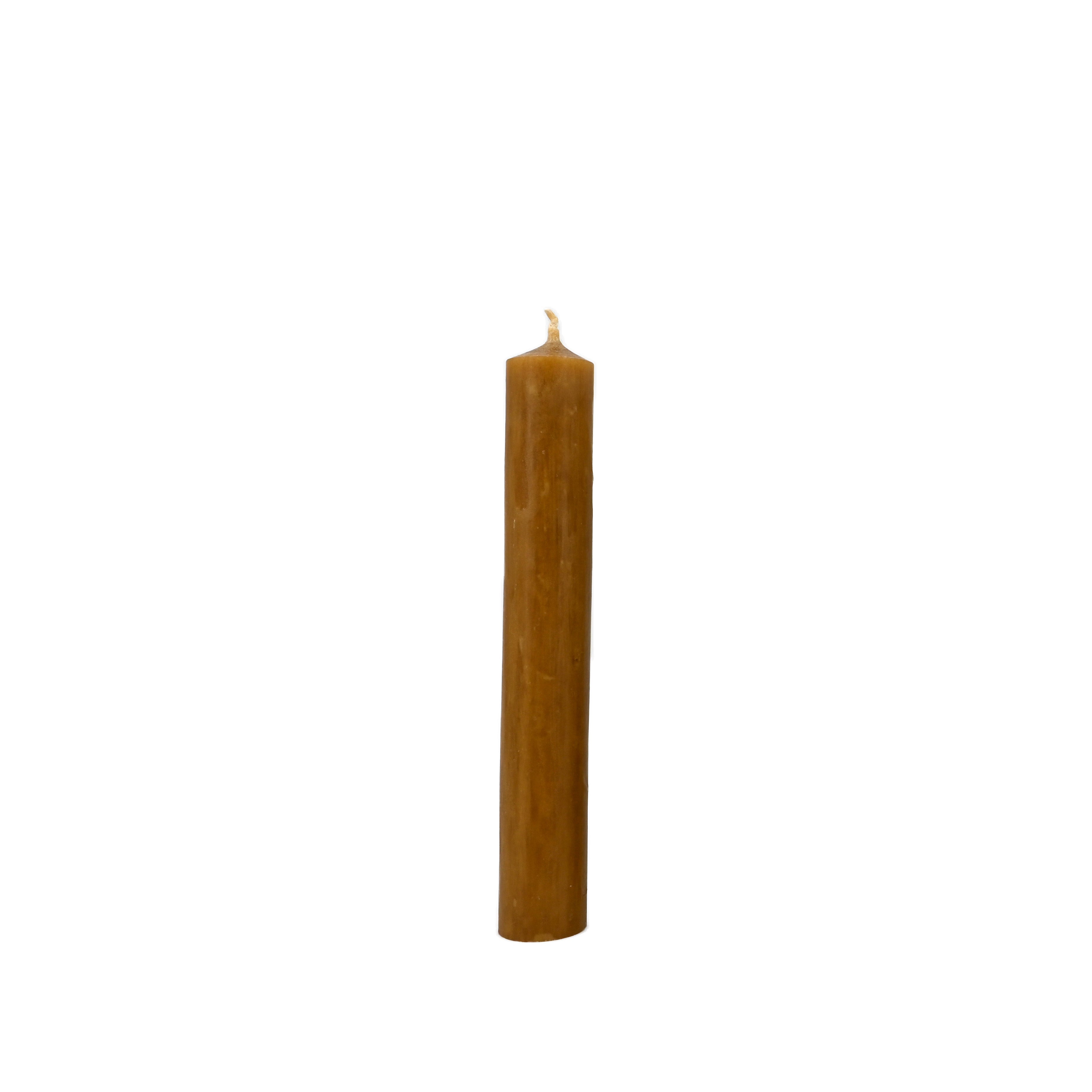 Brown candle on a white background