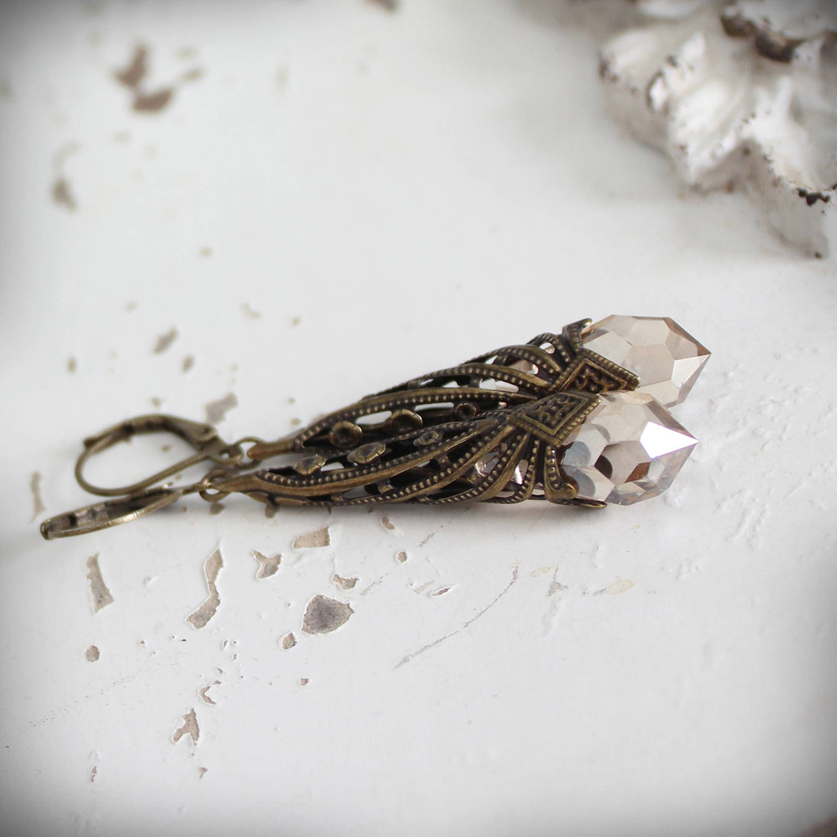 Honey-toned faceted crystal drops in antique-gold brass – Circa 1890