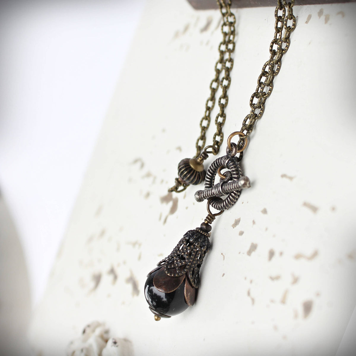 Black onyx pendulum necklace shown full length – Circa 1890