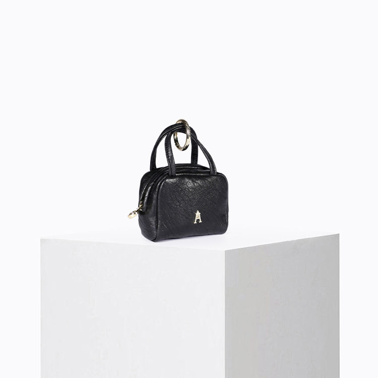Small black bubble lambskin zipped pouch with removable ring – Craie Studio