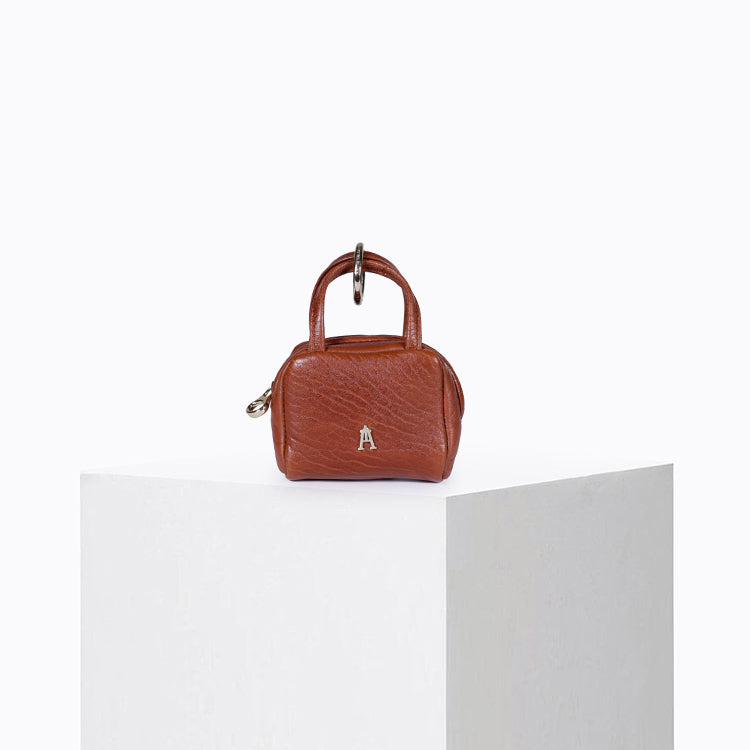 Compact brick-rust bubble lambskin zipped pouch with Craie Studio charm – Craie Studio