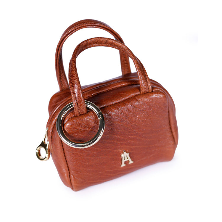 Close-up of the clay bubble lambskin texture and zip pull – Craie Studio