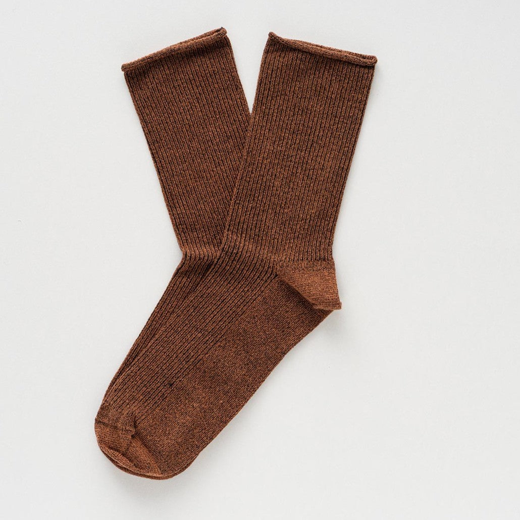 Camel brown socks with a copper shimmer, laid flat to show the rolled cuffs – KLUE