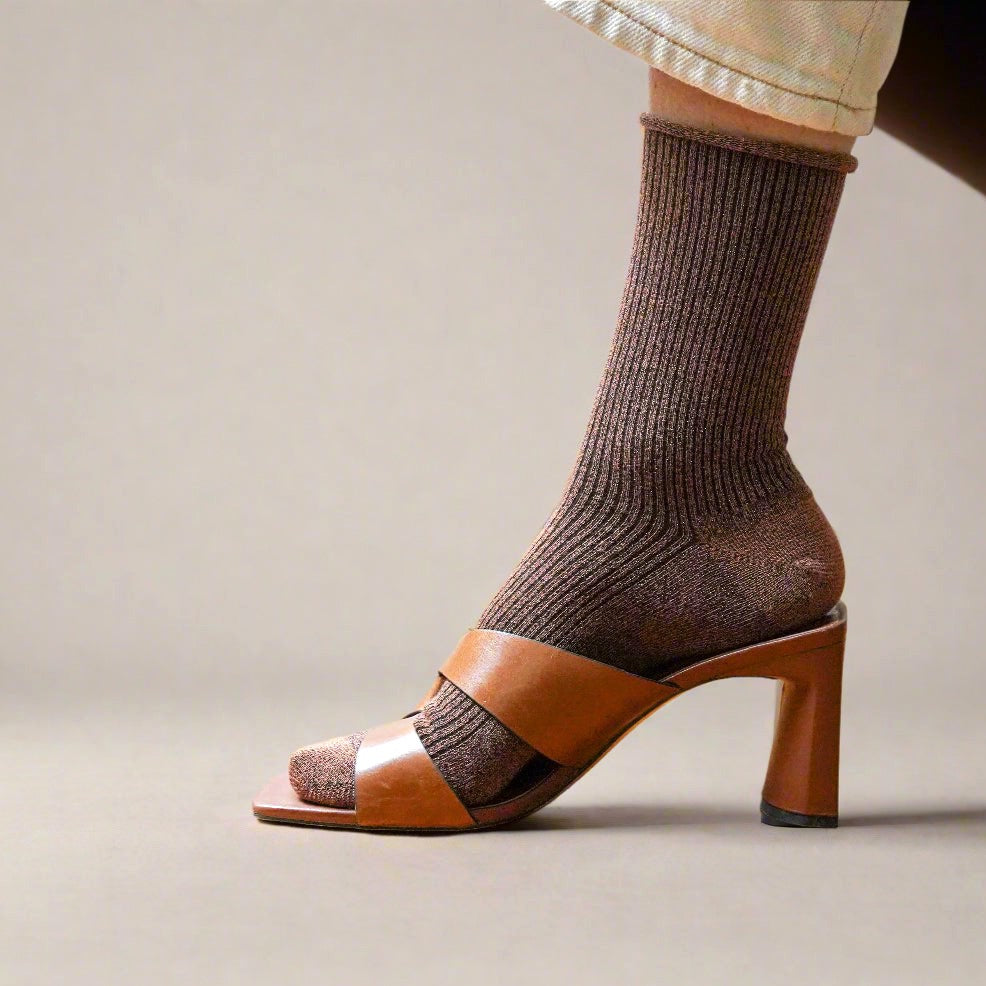 Camel brown shimmering socks worn with tan heeled sandals – KLUE