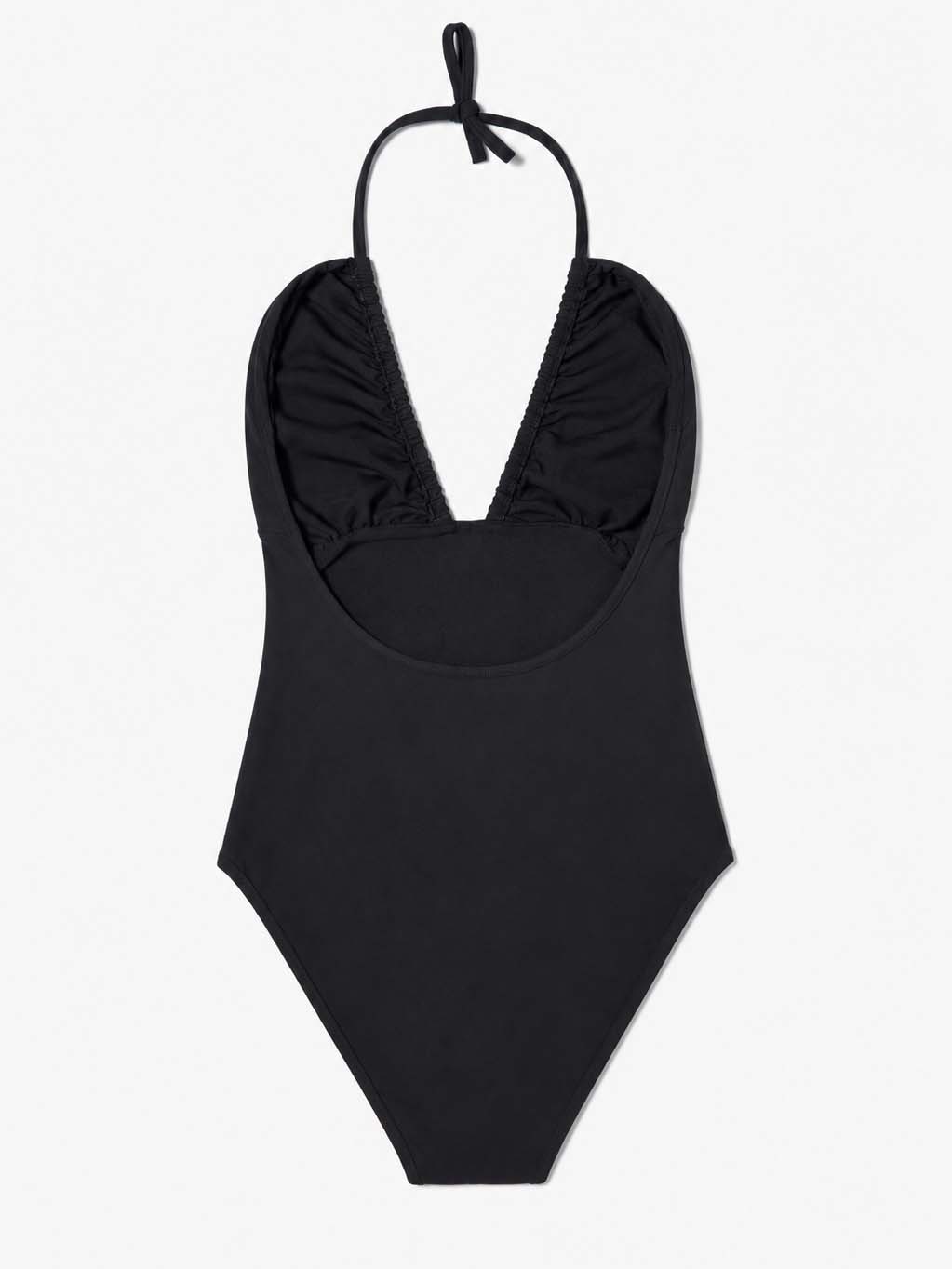 Black one-piece swimsuit styled on the beach, full look – Blanche Edit