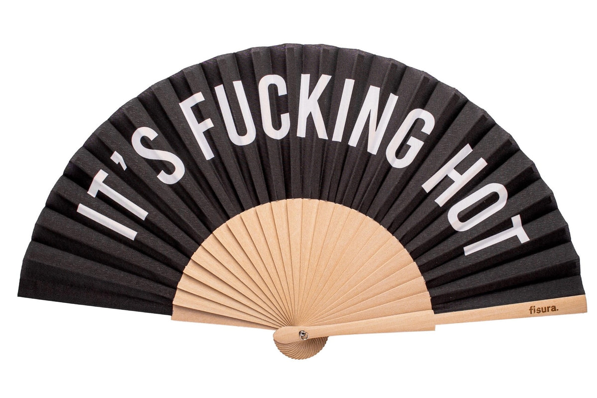 Black hand fan with 'IT'S FUCKING HOT' text on a white background