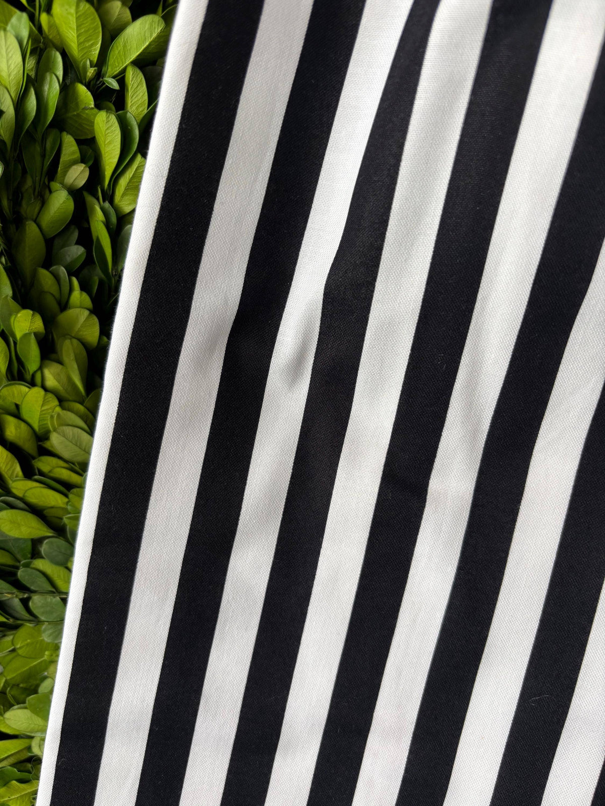 Detail of wide black and white stripes on the bow's designer cotton tail – La Maison Reverie