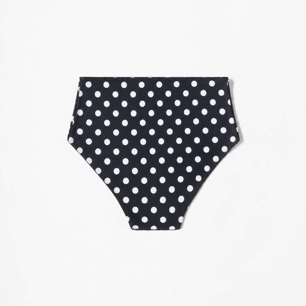 Polka-dot high-waist bikini styled outdoors, full look from the side – Blanche Edit