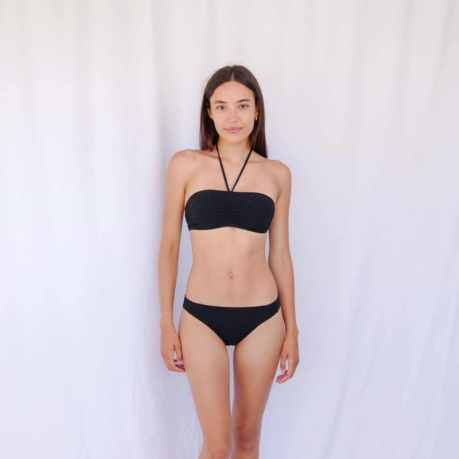 Black bandeau swim top in matte Italian fabric, clean strapless line – Blanche Edit